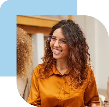 Smiling woman representing the expertise and support of a recruitment agency in international hiring