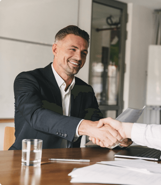 Recruitment agency professional shaking hands, symbolizing global talent acquisition and partnership